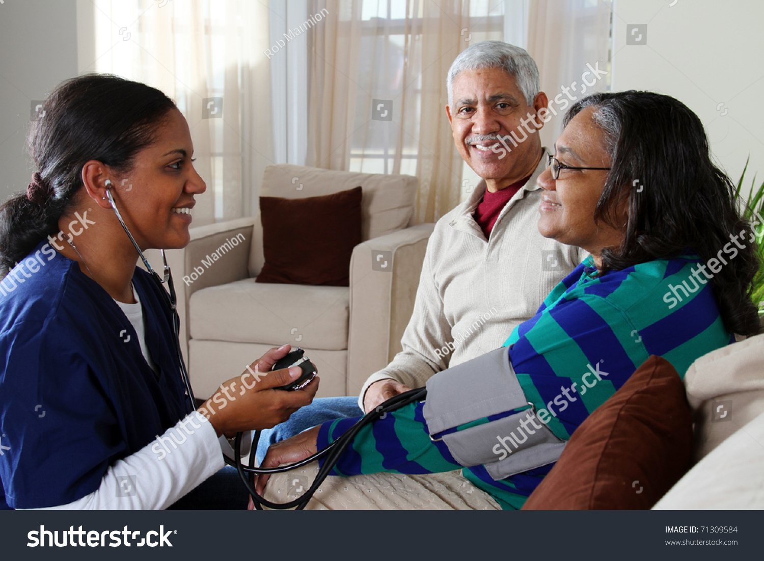 stock-photo-home-health-care-worker-and-an-elderly-couple-71309584